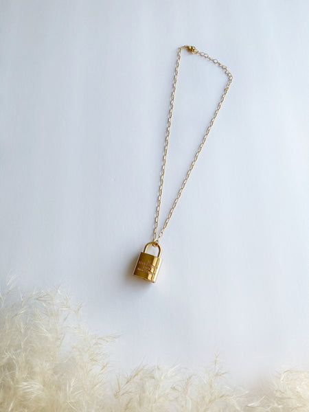 LV lock necklace